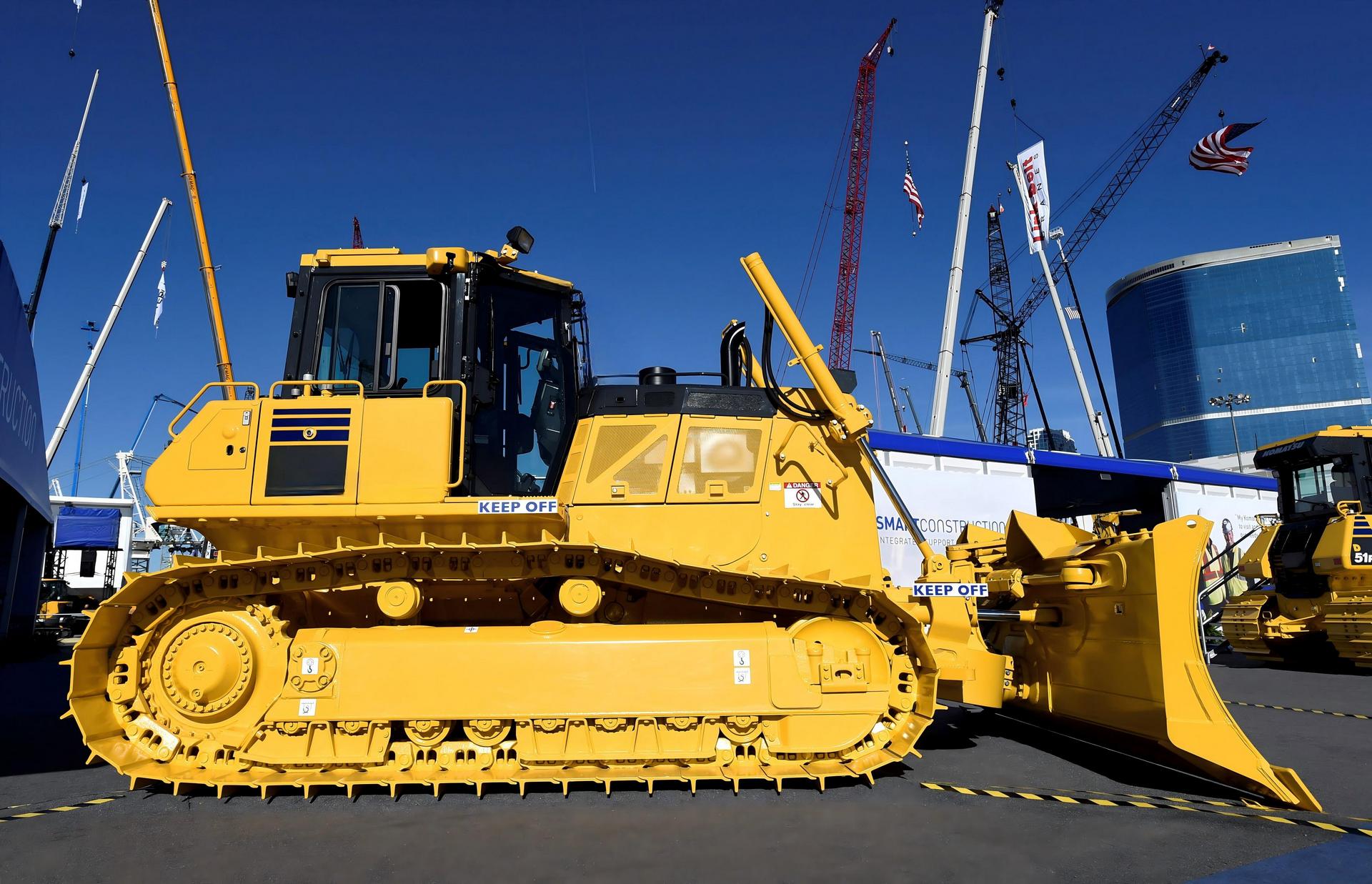 Bulldozer with a front blade at a construction equipment exhibition